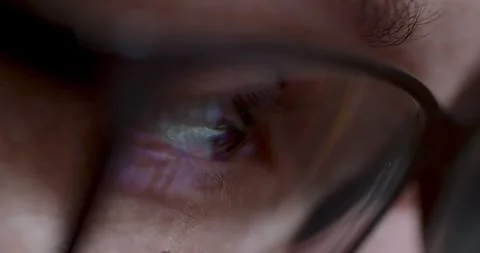 Closeup View of Eyeglasses That Reflect the Light from Digital Screen Stock Footage 289124826