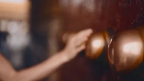 Closeup view of female hand rubbing metal handle for luck and get wish in China. Stock Footage 341463167