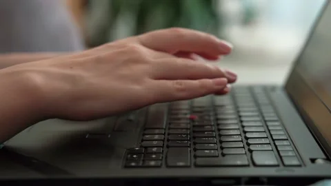 Closeup view of female hands typing on keyboard Stock Footage 166931804