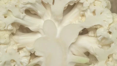 A CloseUp View of a Fresh Cauliflower Showcase Featuring Its Beautiful Details Stockbeeldmateriaal 285040431