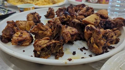 Closeup view of fried chicken served on plate with crispy golden texture Stock Footage 335880311