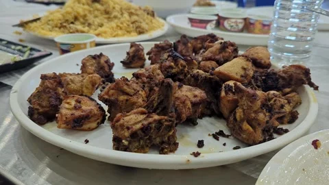 Closeup view of fried chicken served on plate with crispy golden texture Stock Footage 335880317