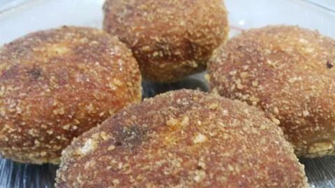 Closeup view of fried pizza bombs or pizza balls are altered form of pizza. Stock Photos