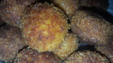 Closeup view of fried pizza bombs or pizza balls are altered form of pizza. Stock Photos