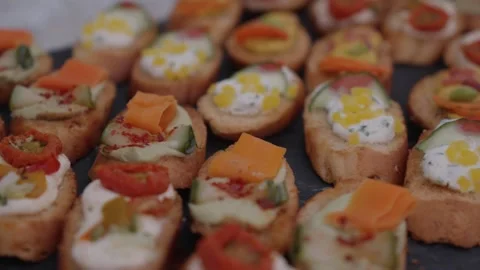 Closeup View of Gourmet Canapés and Crostini Appetizers on Catering Platter Stock Footage 342290189