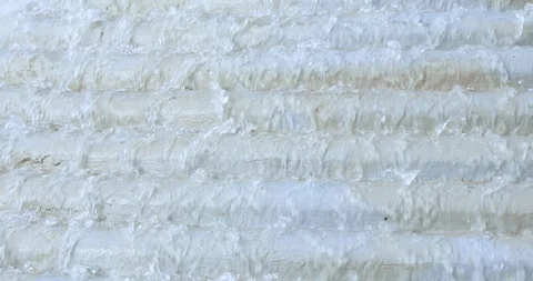 Closeup view on gray wall with falling water Stock Footage 114106475