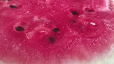 Closeup view Half Watermelon rotating.Fresh juicy fruit . Stock Footage 136442715