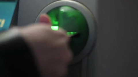 Closeup view hand inserting credit card into an ATM machine. cash machine w.. Stock Footage 272757923