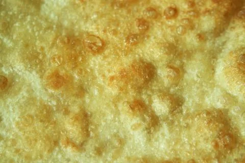 Closeup view of hand made plain bread in oil called paratha roti. Stock Photos