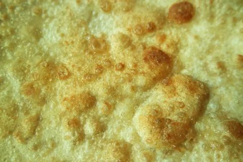 Closeup view of hand made plain bread in oil called paratha roti. Stock Photos
