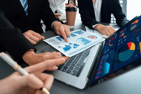 Closeup to view hand using laptop to analyze financial data in harmony office. Stock Photos