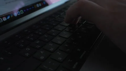 A CloseUp View of Hands Actively Typing on a Laptop Keyboard in Use Vidéo 303829430