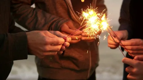 Closeup view of hands of group of people holding bengal lights and lightening 스톡 동영상 81736726