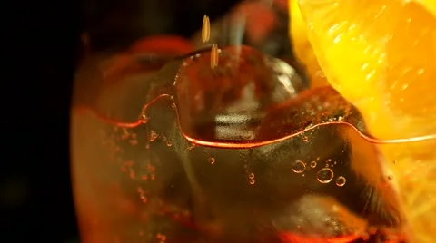 Closeup view, ice cocktail with tonic and orange Stock Footage 65366823
