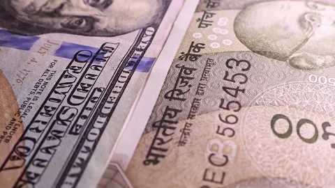 Closeup view of indian 500 rupees and 100 USD american dollars banknotes. Stock Footage 296428357