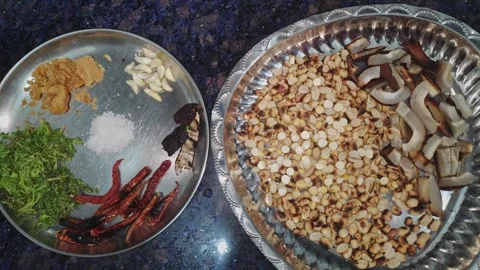 Closeup view of ingredients for spicy Indian chutney showing fresh herbs an.. Vídeos de archivo 337038457
