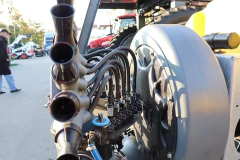 Closeup view of intricate Engine Components prominently featuring Exhaust Pipes Stock Photos