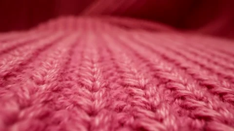 Closeup view of knitted sweater, moving macro shot of red woolen pullover, warm 스톡 동영상 236534304