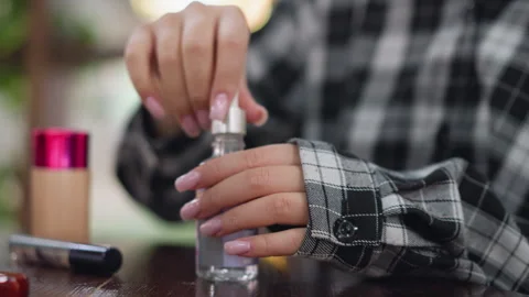 Closeup View of Lady Opening Face Supplement Bottle Stock Footage 305056236