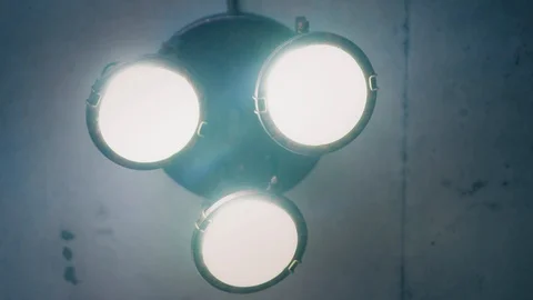 Closeup view on the light of the ceiling lamp is turned on Stock Footage 86687734