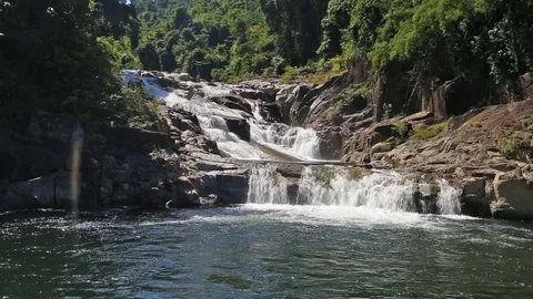 Closeup view of little waterfall on the river current in the moonlight ong Stock-Footage 124579147