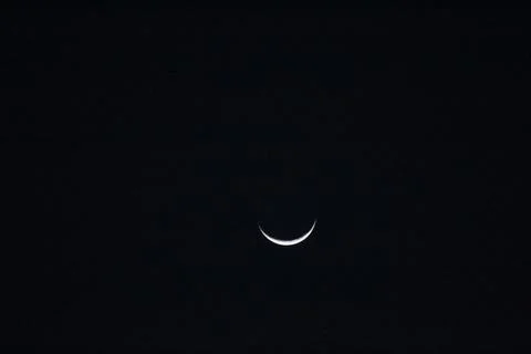 Closeup view of a lunar eclipse isolated on black background Stock Photos