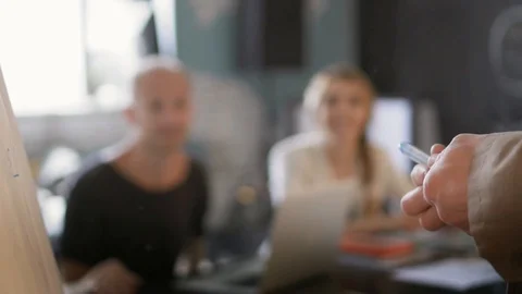 Closeup view on male's hands actively gesticulate explaining business plan to Stock Footage 90490020