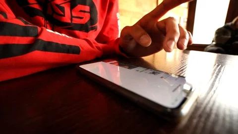 Closeup view of man hands using modern smartphone mobile on table in cafe. Techn 스톡 동영상 116767482