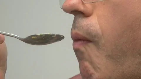 A CloseUp View of a Man Preparing to Enjoy a Colorful and Deliciously Appealing Видео 281930450