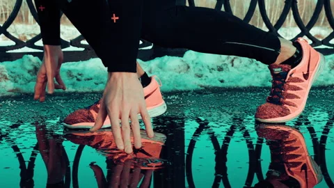 Closeup view of man preparing to run on the street Stock Footage 140773589