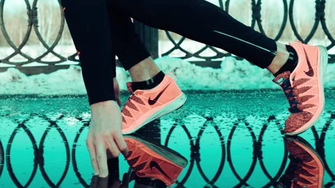 Closeup view of man preparing to run on the street Stock Footage 140773652