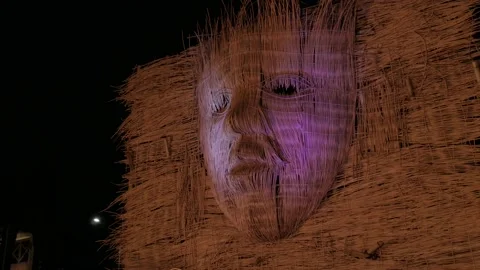 Closeup view of mask arts installation inspired by local culture Stock Footage 142122509