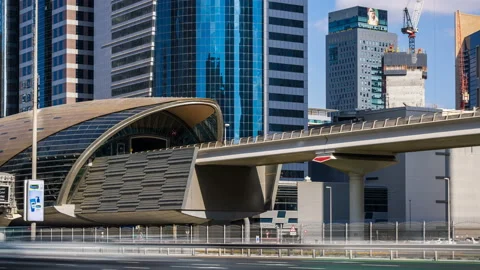 Closeup view of metro station with passing train by day, Dubai, UAE Stock Footage 87821188