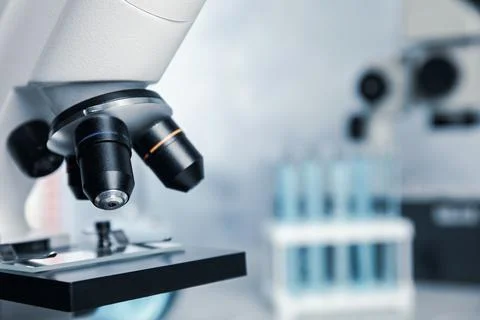 Closeup view of modern microscope in laboratory, space for text. Medical equi Stock Photos