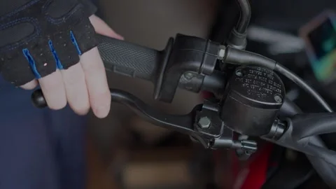 A CloseUp View of Motorcycle Hand Control in Action During a Thrilling Ride Stock Footage 310169518