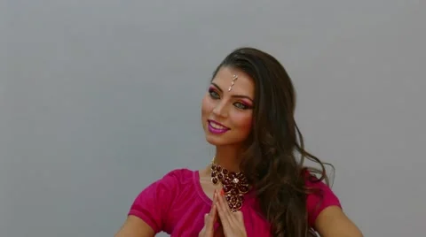 Closeup view on moving torso of Indian woman dancing belly dance Stock Footage 43808219