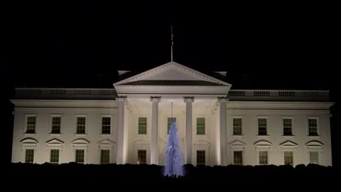 Closeup view at night of the US Presidents home, the White House in Washington Stock Footage 237935152