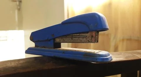 Closeup view of an old rustic plastic stapler Stock Photos