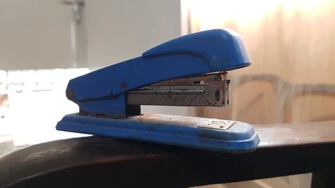 Closeup view of an old rustic plastic stapler Stock Photos