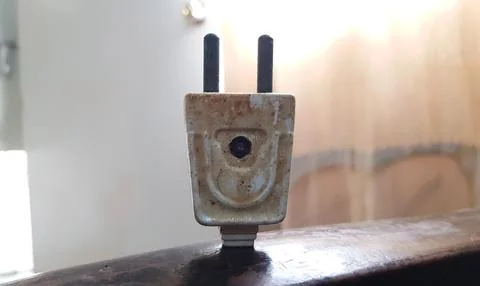 Closeup view of an old rustic two pin plug Stock Photos