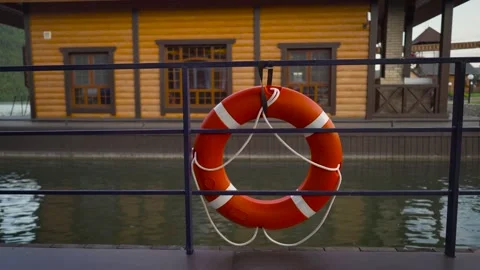 Closeup view of orange lifeline on the ship. Video stock 156223797