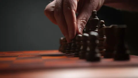 Closeup View of Pawn Move and Hand on Chessboard Stock Footage 236943800