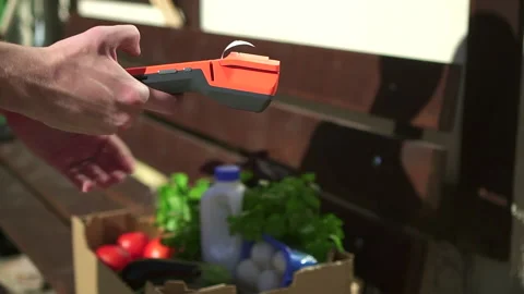 Closeup view of people make contactless payments for purchases at door of house Stock Footage 140315848