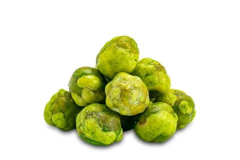 Closeup view pile of dried crispy spicy wasabi coated green peas . Stock Photos