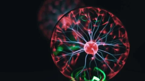 Closeup view of plasma ball with moving energy rays inside on black background Stock Footage