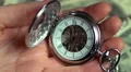 Closeup view of pocket watch in male hands, minutes of precious life passing by HD Footage