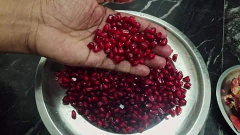 Closeup view of pomegranate arils showing juicy red seeds and fresh fruit t.. Stock Footage 337037896