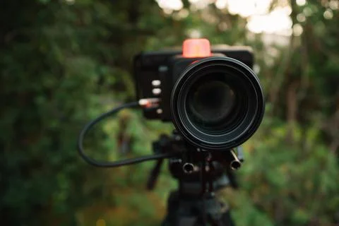 Closeup view of professional broadcast camera with tally mark Stock Photos