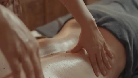 Closeup View Of Professional Masseurs Hand Rubbing Back Of Male Patient In 스톡 동영상 302283360