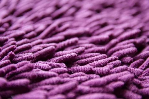 Closeup view of purple carpet texture Stock Photos